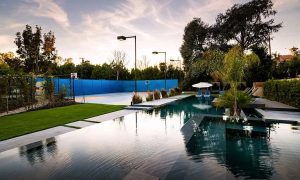 Outdoor Pool and seating area and basketball court