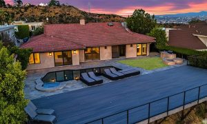 Outdoor pool and seating area and House Profile